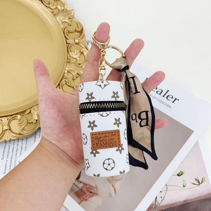 Sakura Lipstick Bucket Bag keychain